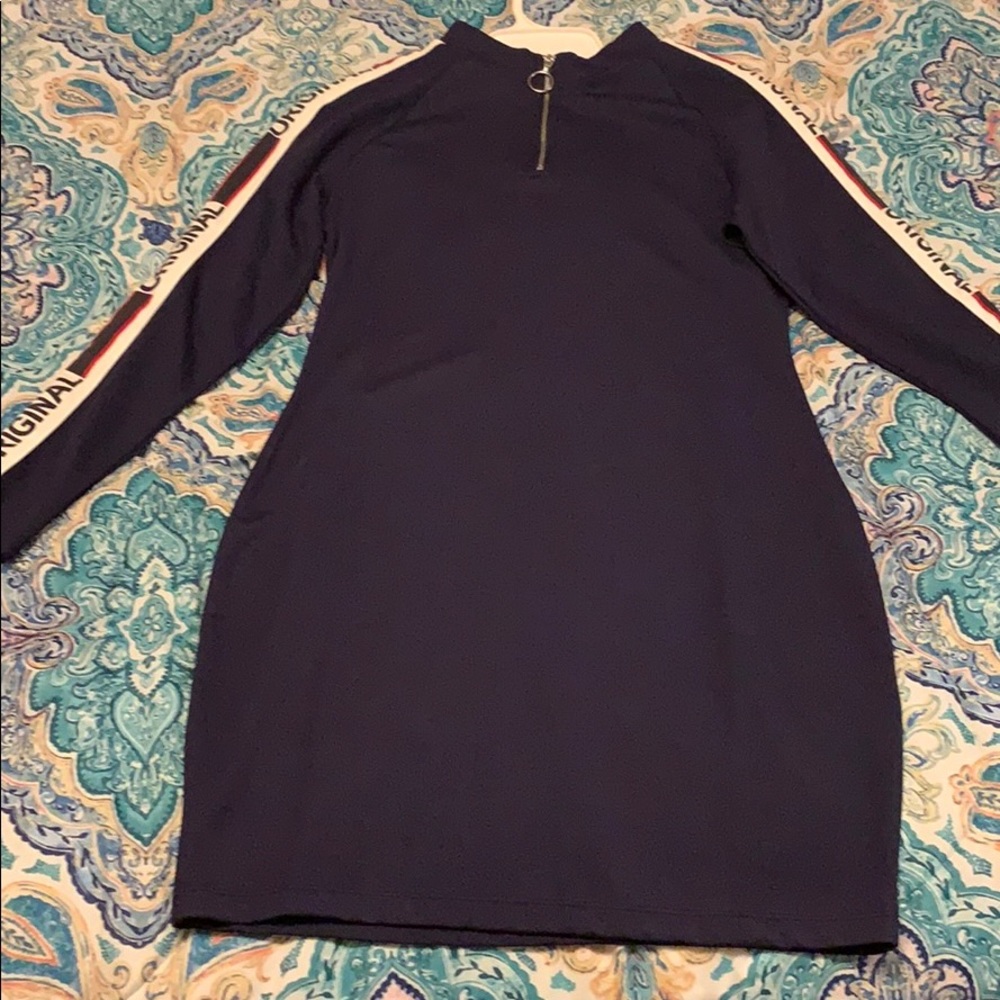 This is a cute short, long sleeve dress